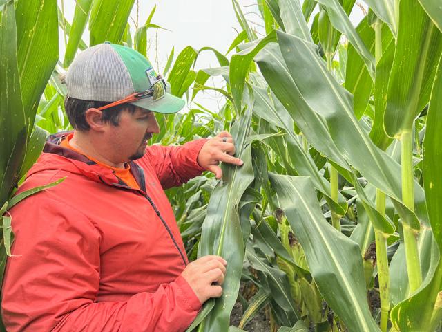 Crop scouting is always on DTN View From the Cab farmer Ethan Zoerb's to-do list. He keeps boots in the field throughout the season. (DTN photo by Pamela Smith)